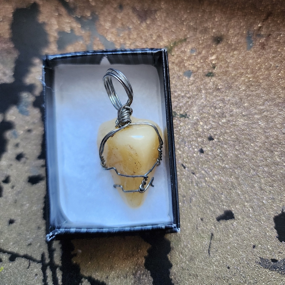 Elegant Silver and Cream Stone Pendant